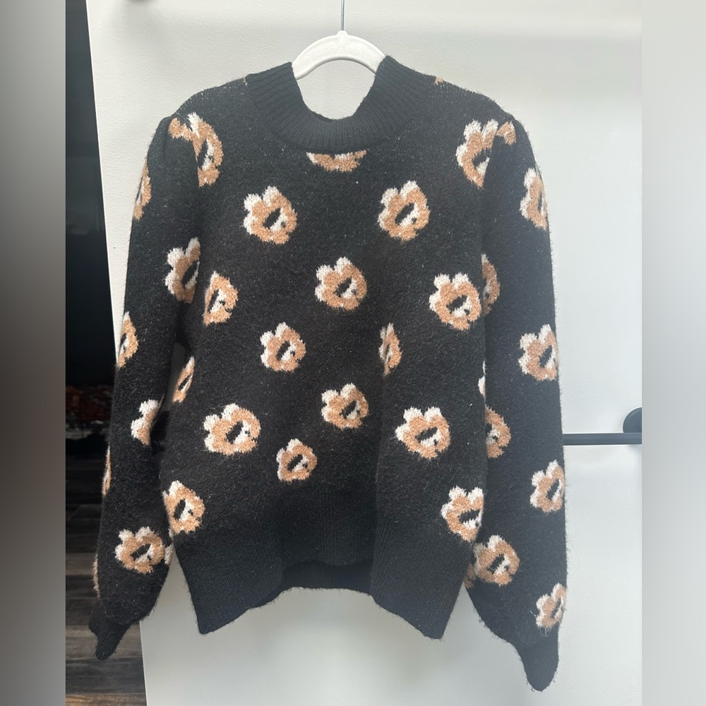 Lush Black Sweater with Floral Accents